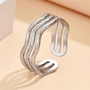 Minimalist 3-layer wave ring with silver hammered texture and open adjustable band