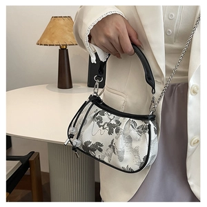 Detail of New Chinese-style embroidered handbag with white fabric and black floral patterns