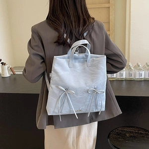Stylish light blue wrinkled leather backpack with ribbon bows and large capacity design