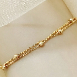 Elegant gold double-layer snake and ball station chain necklace for women fashion