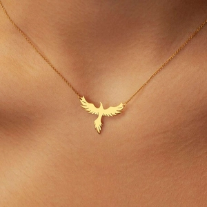 Collier pendentif phénix en or poli pour femme sur une chaîne en acier inoxydable