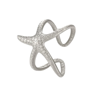 Détails d'une bague étoile de mer vintage avec textures biologiques et anneau ouvert