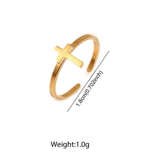 Detail of adjustable golden cross open ring showing 1.8cm diameter and 1g weight