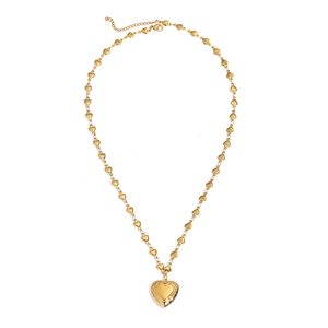Collier médaillon cœur doré avec bords gravés vintage et maillons de chaîne en cœur