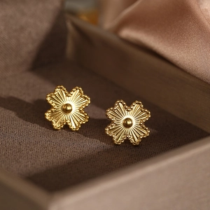 Golden lucky four-leaf clover earrings with sunburst texture and beaded edges