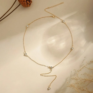 Minimalist gold-plated Y-shaped necklace with circular sparkling crystal accents