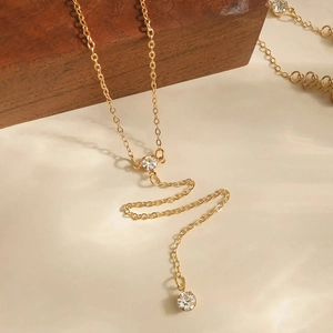 Elegant gold-tone Y-shaped stainless steel necklace featuring subtle round zircon accents