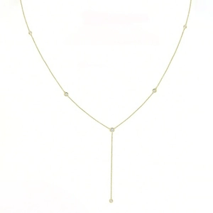 Minimalist gold Y-shaped lariat necklace with bezel-set clear round cubic zirconia stones