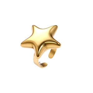 Detailed view of a gold star-shaped adjustable stainless steel ring with a polished finish