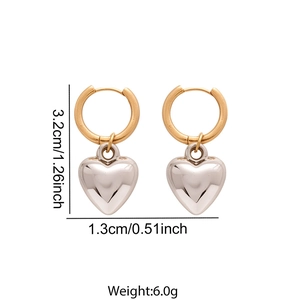 Minimalist heart-shaped contrast earrings in polished gold and silver stainless steel