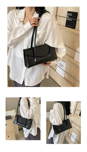 Three-angle views of a black glossy leather rectangular underarm bag with long straps