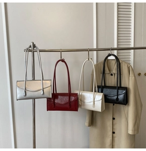 Chic glossy leather shoulder bags in silver, burgundy, beige, and black colors
