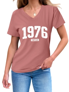 Detail of V-neck cotton T-shirt featuring vintage 1976 print in rustic brick red