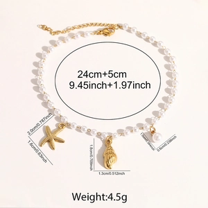 Detail showing shell and starfish charms on a pearl anklet with dimensions and extension chain