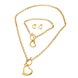 Women's gold stainless steel jewelry set featuring hollow heart necklace bracelet and earrings