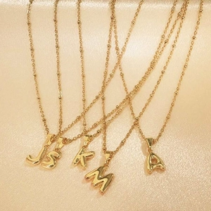 Bubble initial letter pendant necklace in gold finish with delicate bead chain for women