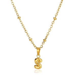 Close-up of golden puffy letter S pendant on a minimalist beaded stainless steel chain