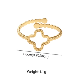 Detailed view of adjustable golden beaded ring with hollow clover design and dimensions