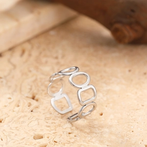 Detail showing the polished silver geometric hollow pattern of this adjustable ring