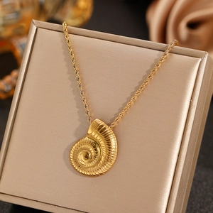 Elegant gold seashell pendant necklace on twist rope chain with champagne gift box