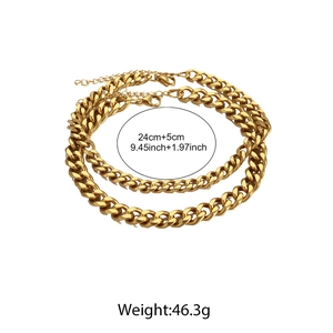 Detail of gold Cuban link anklet set featuring 24cm plus 5cm extension and lobster clasp
