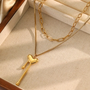 Double-layered 18k gold plated stainless steel necklace with lava heart pendant