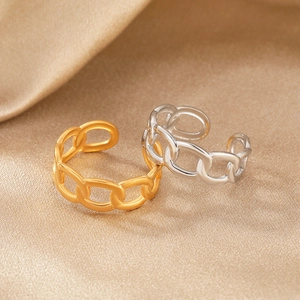 Detailed close-up of 18K gold and silver hollow chain link adjustable open rings