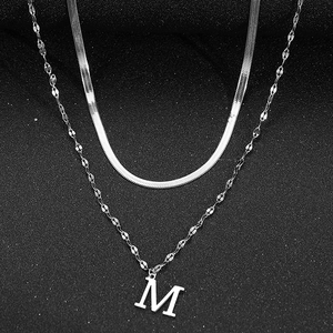 Double-layered stainless steel necklace featuring a herringbone chain and M letter pendant