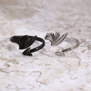 Adjustable minimalist angel and devil wing rings in black and silver stainless steel