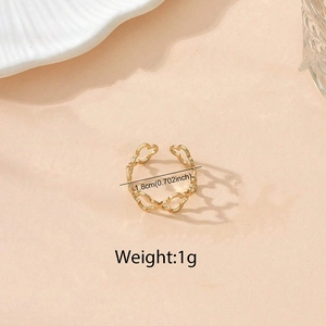 Macro shot of gold hollow heart ring showing 1.8cm diameter and 1g lightweight detail