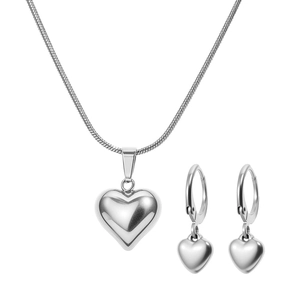 Polished stainless steel jewelry set featuring heart pendant necklace and hoop earrings