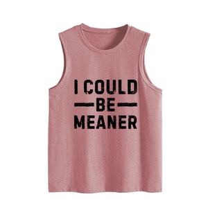 Detail showing the I COULD BE MEANER black slogan print on pink cotton tank top