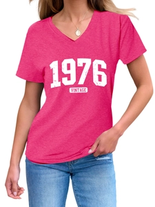 Detail of rose red V-neck T-shirt with vintage 1976 print and comfortable cotton fabric