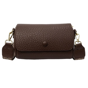 Deep brown lychee texture cylinder crossbody bag with vintage geometric wide strap