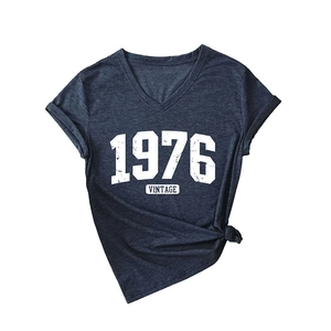 Vintage 1976 dark grey V-neck t-shirt with knotted hem and soft cotton blend fabric