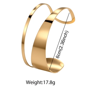 Detailed view of wide 18K gold-plated stainless steel cuff bracelet with 6cm inner diameter