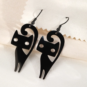 Minimalist black stainless steel earrings featuring hollow hanging cat pendant design