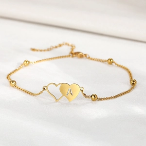 Gold stainless steel heart anklet with letter A pendant and metal bead accents