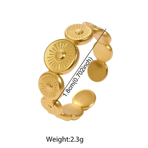 Detailed view of adjustable gold stainless steel ring with relief sunflower design