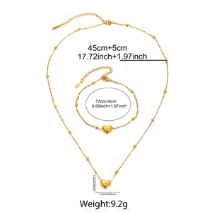 Detailed dimensions of gold beaded heart necklace and bracelet set with size labels