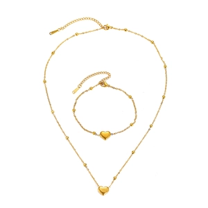 Elegant gold stainless steel beaded necklace and bracelet set with heart pendant charms