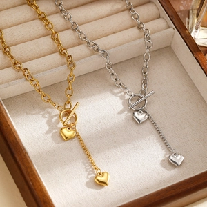Collier pendentif cœur en acier inoxydable poli avec fermoir à bascule en or et argent