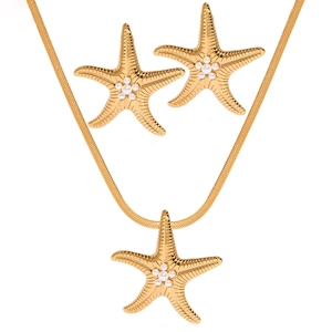 Golden starfish jewelry set with pearl accents and flat snake chain necklace