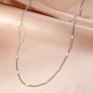 Minimalist silver stainless steel curb chain necklace with polished flat metal accents