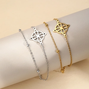 Poliertes Edelstahl-Blumenarmband in Gold und Silber mit Perlenverzierung