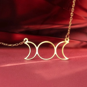 Elegant gold Triple Moon Goddess necklace with crescent and full moon pendant for women