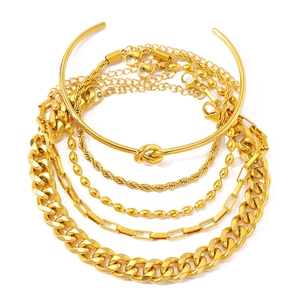 Five-piece gold stainless steel jewelry set with paperclip, Cuban and snake chain layers