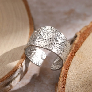 Minimalist wide C-shape adjustable open ring with irregular hammered texture in silver