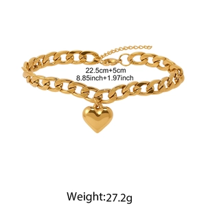 Close-up of golden Cuban chain anklet with heart pendant and size specifications