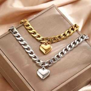 Polished stainless steel Cuban link anklets with heart charms in gold and silver finish